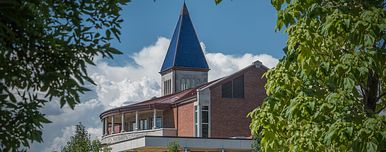 SIE building with blue sky
